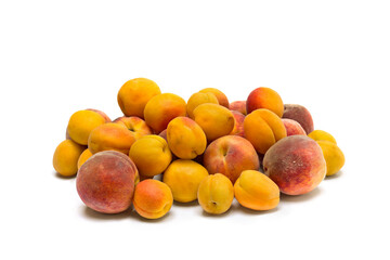Fresh orange apricots and peaches fruits on white background