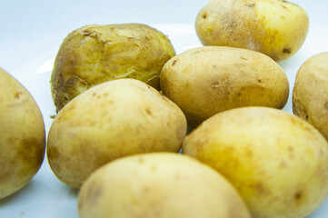 Boiled large yellow potatoes close-up