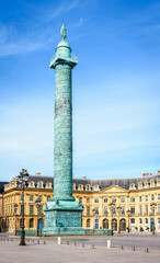 The Vendôme column stands at the center of the place Vendôme, one of the most luxurious squares in Paris, France, lined with luxury boutiques and hotels and private mansions.