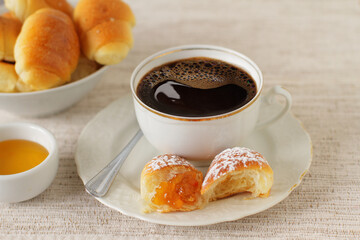 Mini sweet buns filled with orange jam and coffee
