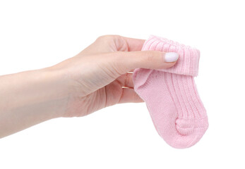 Pink socks for newborn child baby in hand on white baclground isolation