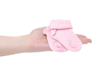 Pink socks for newborn child baby in hand on white baclground isolation
