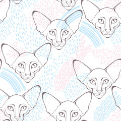 Oriental cat face. Seamless vector pattern with cats and decorative elements on white. Hand-drawn vector illustration. Animal art background.