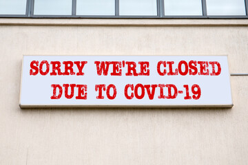 SORRY WE’RE CLOSED DUE TO COVID-19. Hotels, cafes and service concept. Illuminated advertising