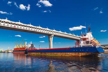 old large cargo ship in a river port