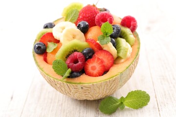 mixed fruit salad with melon, strawberry, blueberry, kiwi