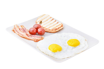 European Breakfast tray with fried eggs, bacon, kiln, tomatoes and hot toast