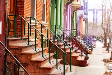 Many colorful different staircases and handrails of typical Albany houses on Lancaster street, NY,...