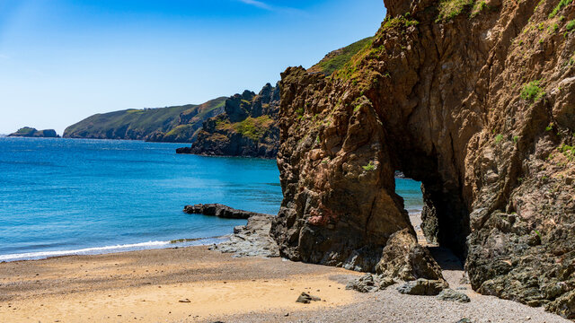Cliffs, beach and rocks sunny day in sark