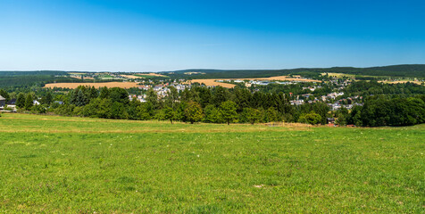Fototapeta na wymiar Markneukirchen town with beautiful hilly surrounding in Germany