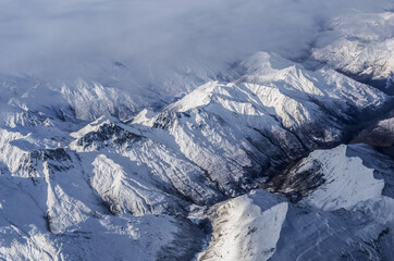 Fototapeta na wymiar Aerial View of Mountain Ranges in South Island near Queenstown, New Zealand; Winter Season 