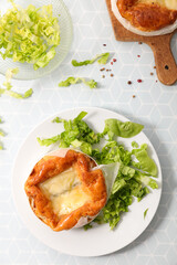 baked camembert with fresh lettuce