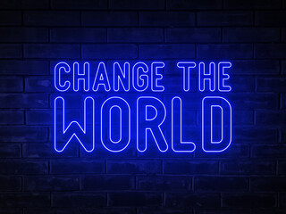 Change the world - blue neon light word on brick wall background