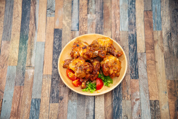 delicious fried chicken wings with sauce