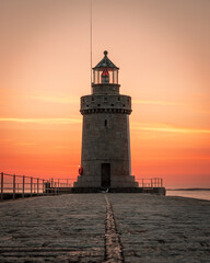 lighthouse at sunrise in Guernsey 