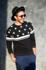 Young hipster guy smiling