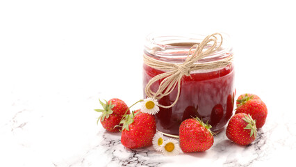 strawberry jam in jar and fresh fruit