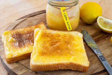 Lemon butter on two pieces of toast