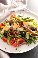 mixed vegetable salad with anchovy, egg, tomato and bean green