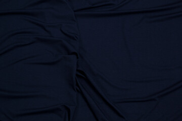 Fabric cotton fold, top view. Blue textile	
