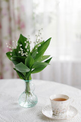 lilies of the valley in white room