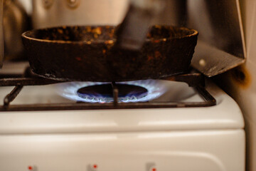 Gas burner on stove. Selective focus.