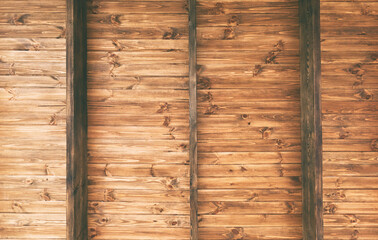 The beautiful background from a lot of wooden brown planks