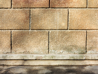 grunge background, brick wall texture plaster wall and blocks road sidewalk abandoned exterior urban background for your concept or project