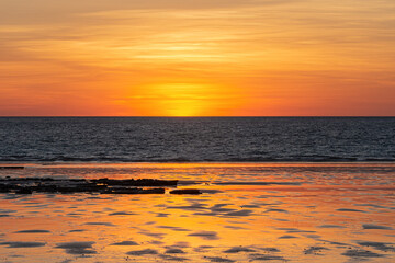 Sunset over the ocean at Cable Beach at sunset, Broome, Kimberley, Western Australia, Australia