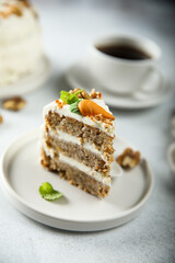 Traditional carrot cake with cream cheese and walnuts
