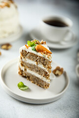 Traditional carrot cake with cream cheese and walnuts
