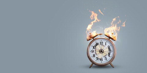 Out of time concept - clock on fire with actual flame