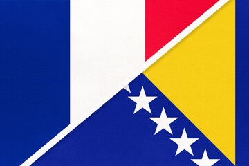France and Bosnia and Herzegovina, symbol of two national flags from textile. Championship between two european countries.