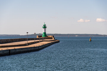 Fototapeta premium The lighthouse on the east pier in the port of Sassnitz on the island of Rügen