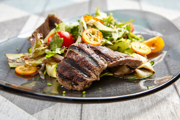 Salad with veal and kumquat