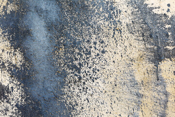 Creative beautiful blue background, blue spray paint on concrete with cracks and scratches. Landscape style. Grungy concrete surface. Great background or texture.