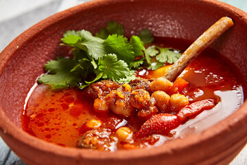 Tomato soup with mutton and chickpea