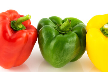 Trio of Bell Peppers close up isolated on a white background.