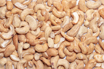 Roasted cashew nuts, texture and background.