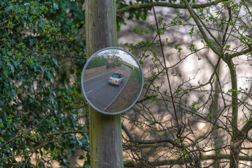 Blind spot convex mirror on a post in Aspley Guise, Milton Keyns