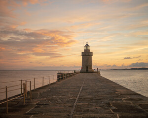 lighthouse on the pier at Sunrise Guernsey