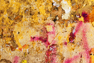 Naklejka premium Creative background beautiful concrete casually painted yellow and burgundy paint, cracks and scratches. Grungy concrete surface. Great background or texture for your project.