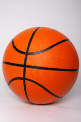 orange basketball ball on a light background
