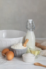 Ingredients for bakery butter flour, milk, oil, eggs, sugar, kitchen accessories