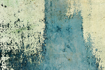 Abstract background concrete painted yellow and green paint, weathered with cracks and scratches. Landscape style. Grungy Concrete Surface. Great background or texture.