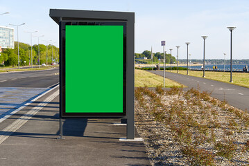 glass bus stop by the sea, with a chroma key advertising space. Blank billboard and outdoor...
