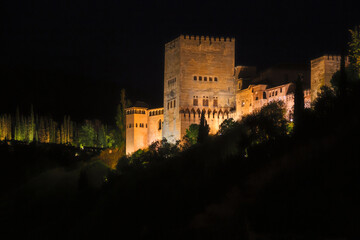 Panoramic night view of the Alhambra in the city of Granada, Spain.