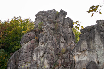 Sandstone rock formation Externsteine in Teutoburg Forest, Germany .