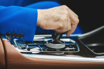 Car`s salon from inside. Driver in auto