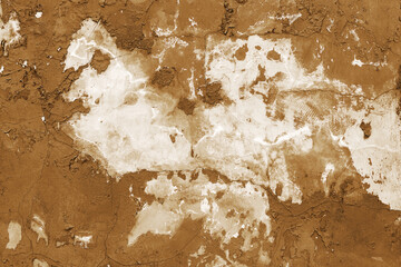Dirty concrete wall with yellow streaks of water, cracks and scratches. Grungy concrete surface. Great background or texture for your project. Sepia